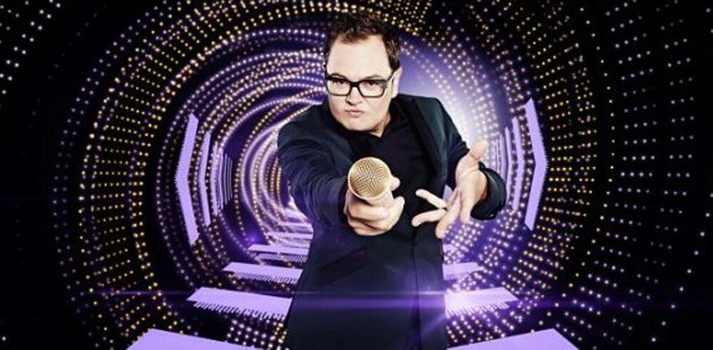 Alan Carr, who hosts The Singer Takes It All.