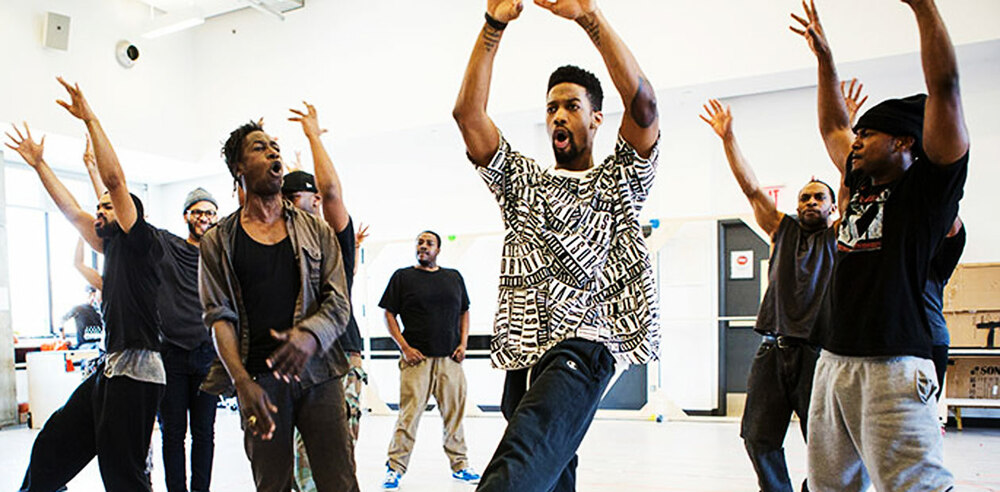 The cast of Holler If Ya Hear Me in rehearsal