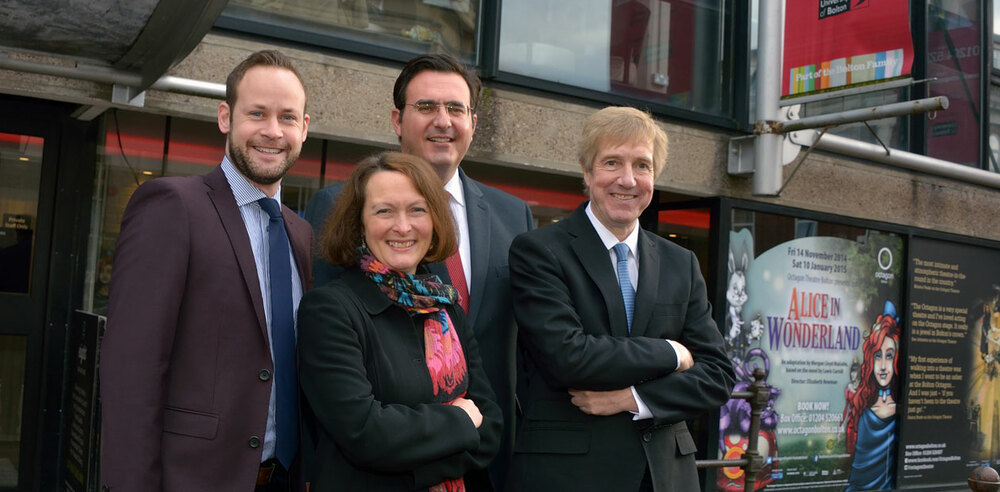 David Thacker (right) with representatives from the University of Bolton and the Octagon