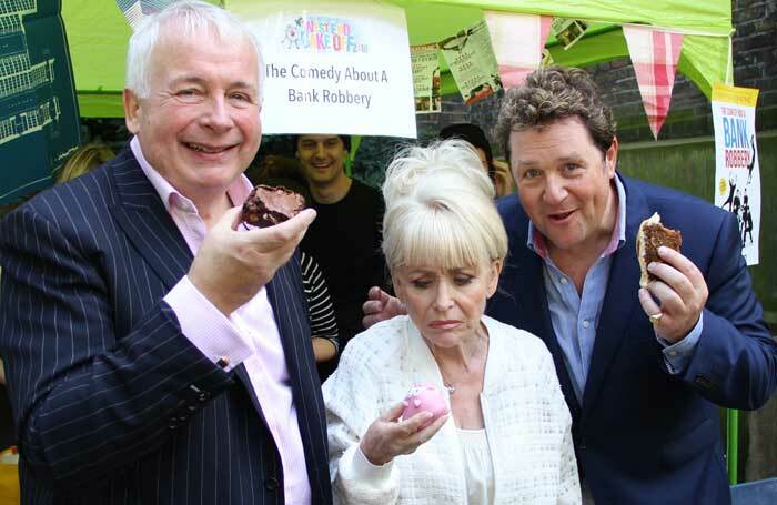 Judges Bigginss, Ball and a bemused Babs. Photo: Mark Lomas