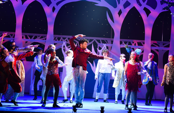 Kristian Cunningham and the junior cast in Cinderella at Wilde Theatre, Bracknell. Photo: Alex Harvey-Brown