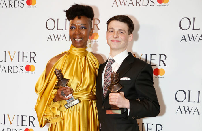 Noma Dumezweni and Anthony Boyle with two of the nine awards won by Harry Potter and the Cursed Child at the Oliviers. Photo: Pamela Raith