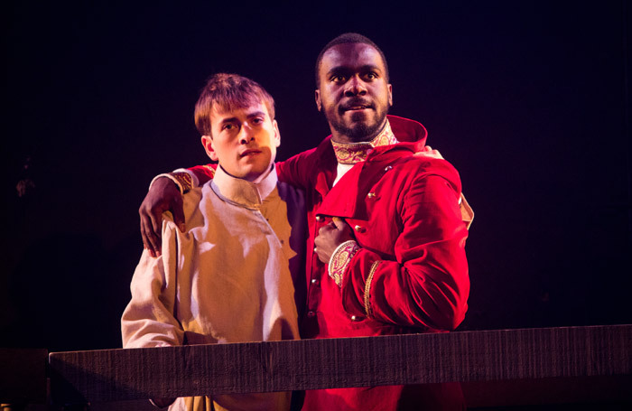 Tom England and Thierry Mabonga in Brothers Karamazov at Tron Theatre, Glasgow. Photo: John Johnston