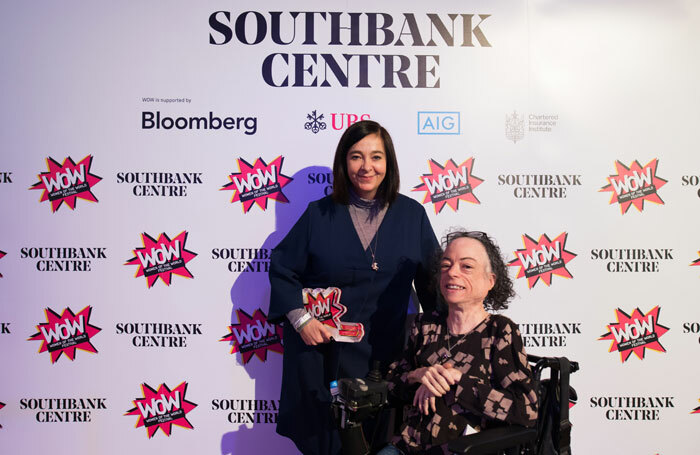 Royal Court artistic director Vicky Featherstone collecting her award from actor and comedian Liz Carr. Photo: Alice Boagey