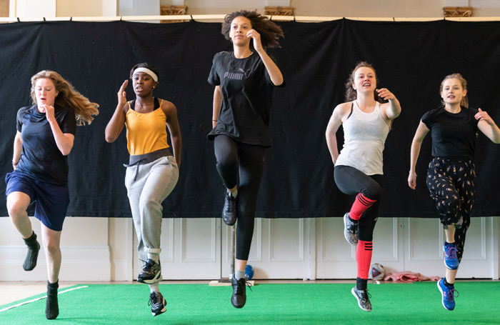 The cast in rehearsals for The Wolves at Theatre Royal Stratford East. Photo: Manuel Harlan