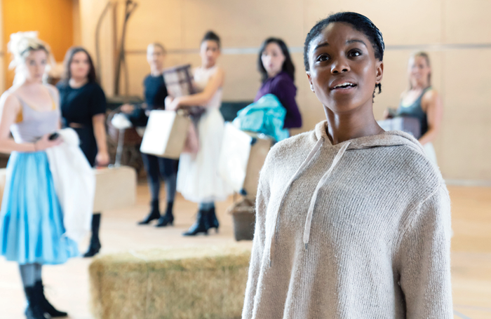 Amara Okereke and members of the ensemble in rehearsals for Oklahoma! Photo: Johan Persson