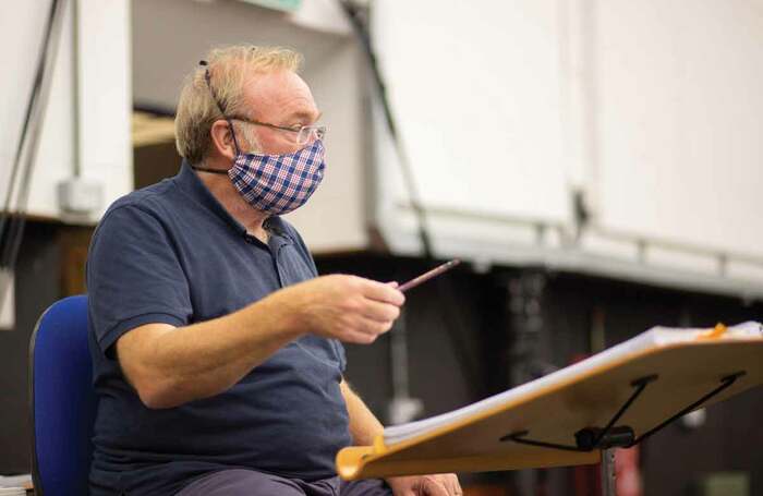  Martyn Brabbins in rehearsals. Photo: Pablo Strong