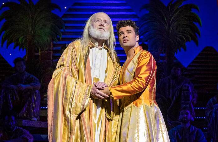 Metcalfe as Jacob (left) with Joe McElderry as Joseph (right) in Joseph and the Amazing Technicolor Dreamcoat. Photo: Mark Yeoman