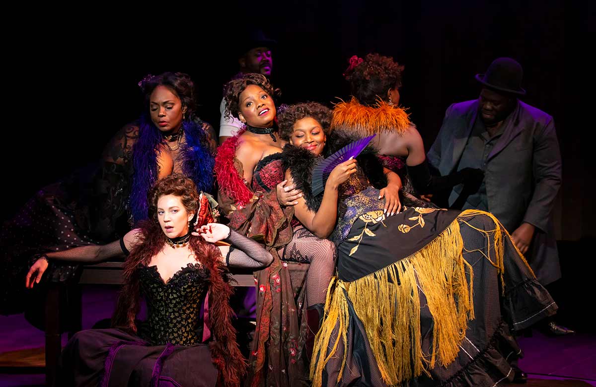 Krysty Swann (centre) and the cast of Intimate Apparel. Photo: Charles Erickson