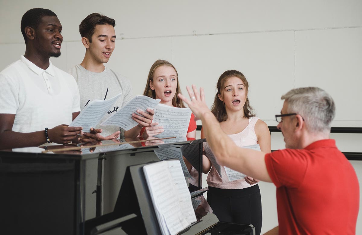 ArtsEd head of music Chris Whitehead teaches a singing class. Photo: Robin Savage