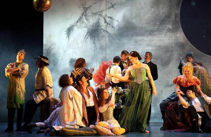 Alison Langer (centre, standing) in La Traviata at Leeds Grand Theatre. Photo: Richard H Smith