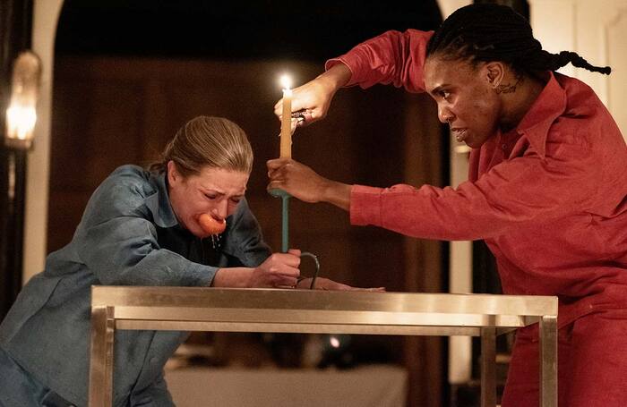 Katy Stephens and Kibong Tanji in Titus Andronicus at the Sam Wanamaker Playhouse, Shakespeare's Globe, London. Photo: Camilla Greenwell