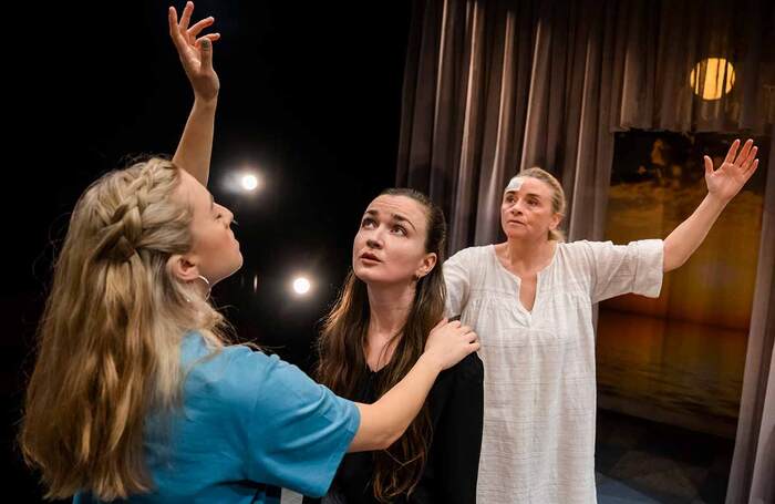 Ruby Campbell, Amy Molloy and Mairead McKinley in Akedah at Hampstead Theatre Downstairs, London. Photo: Tristram Kenton