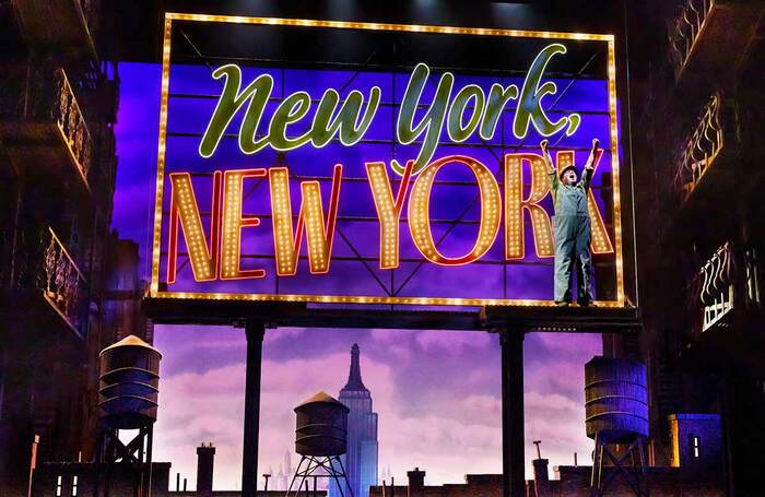 Set (including prominent logo) for New York, New York on Broadway. Photo: Paul Kolnik