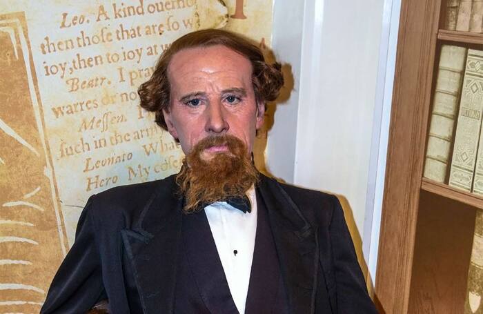 Wax figure of Charles Dickens at Madame Tussauds museum. Photo: Shutterstock