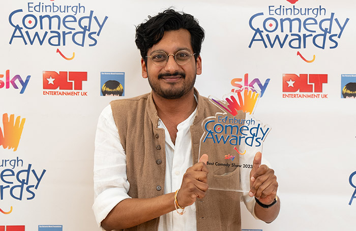 Ahir Shah with his Edinburgh Comedy Award