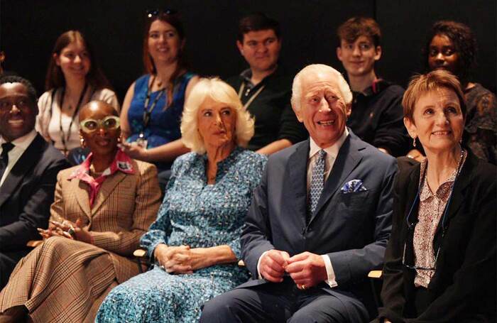 Queen Camilla and King Charles watch a performance of House of Ife by some of RADA's final-year students, alongside David Harewood, Cynthia Erivo, Marcus Ryder and Niamh Dowling. Photo: RADA/Ikin Yum