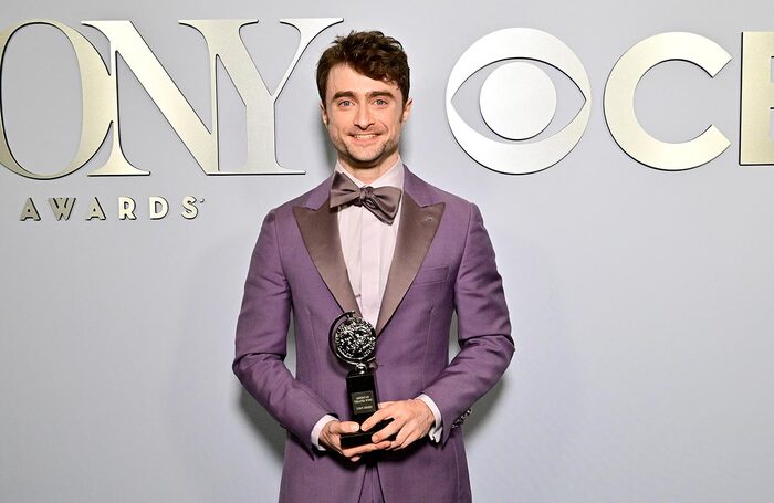 Daniel Radcliffe, recipient of the best performance by an actor in a featured role in a musical award for Merrily We Roll Along, poses during The 77th Annual Tony Awards. Photo: Eugene Goloqursky Photography/Getty