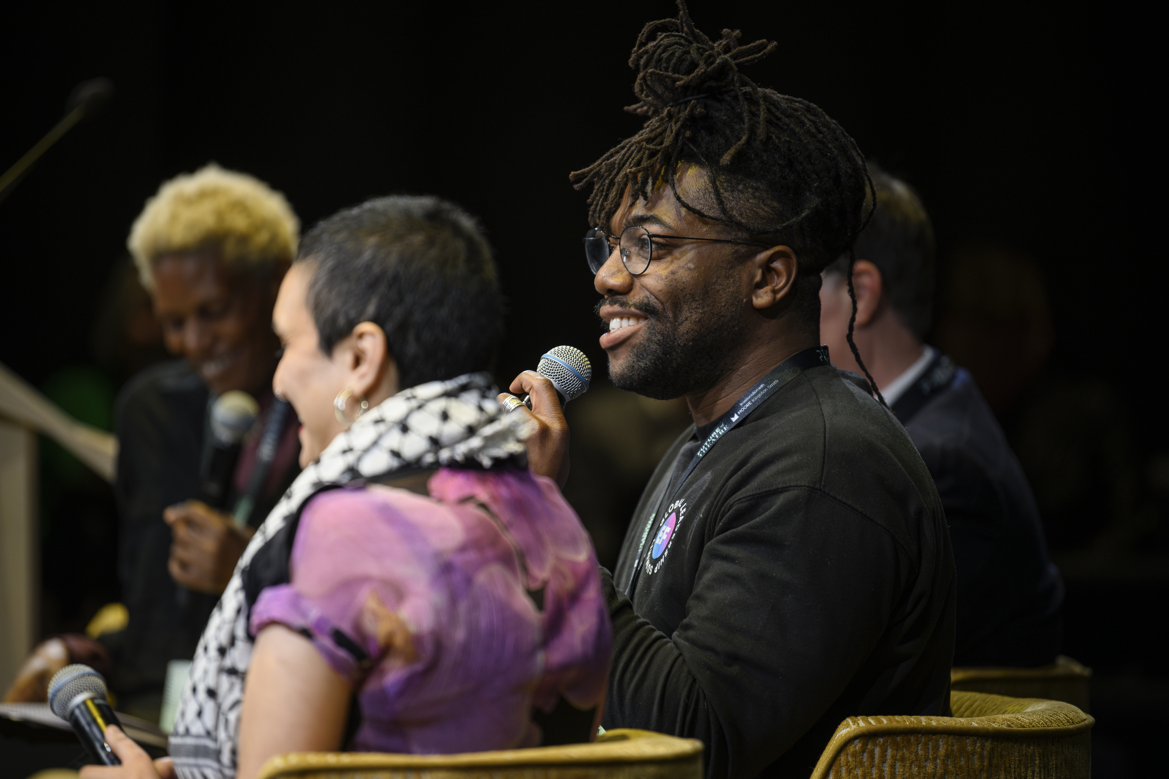 Fehinti Balogun speaking on climate activism at Future of Theatre