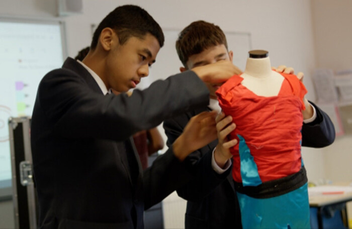 Students during a costume design workshop