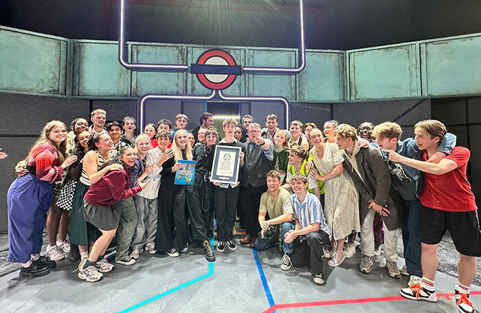 The cast of Our House with their Guinness World Record. Photo: NYMT