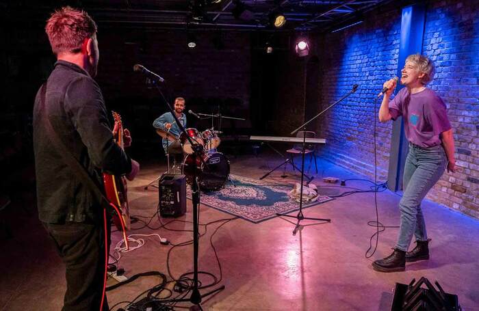 Royce Cronin, James Westphal and Laura Evelyn in The Band Back Together at Arcola Theatre, London. Photo: Kate Hockenhull