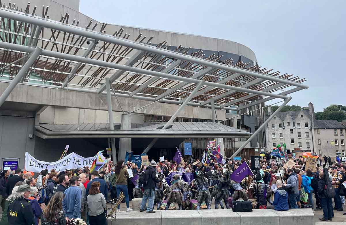 Demonstrators gathered outside the Scottish parliament. Photo: Fergus Morgan