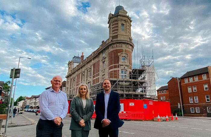 Swansea Council chief executive Martin Nicholls, Tramshed Tech chief executive Louise Harris and Swansea Council leader Rob Stewart in front of the redeveloped Palace Theatre  